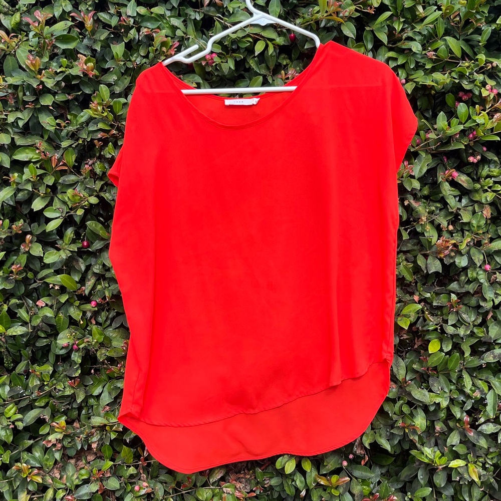 Coral high low blouse